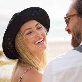 Close up face of cheerful couple