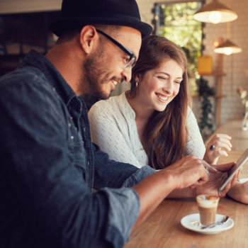 Happy Couple In A Coffee Shop