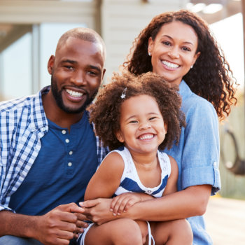 Young african american family embracing